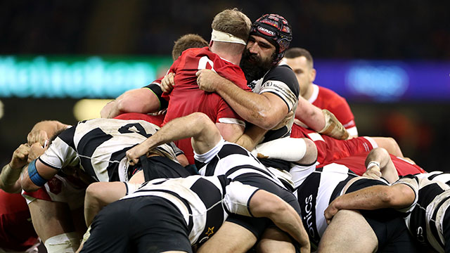 Aaron Wainwright and Josh Strauss compete for the ball