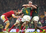 Aaron Wainwright is tackled by Siya Kolisi during Wales v South Africa match in 2021 Autumn Internationals