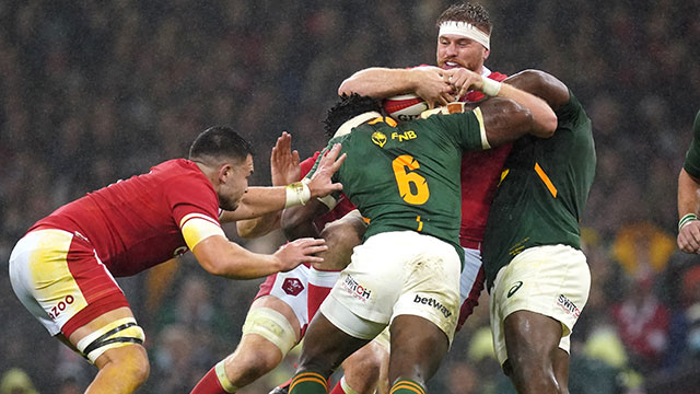 Aaron Wainwright is tackled by Siya Kolisi during Wales v South Africa match in 2021 Autumn Internationals