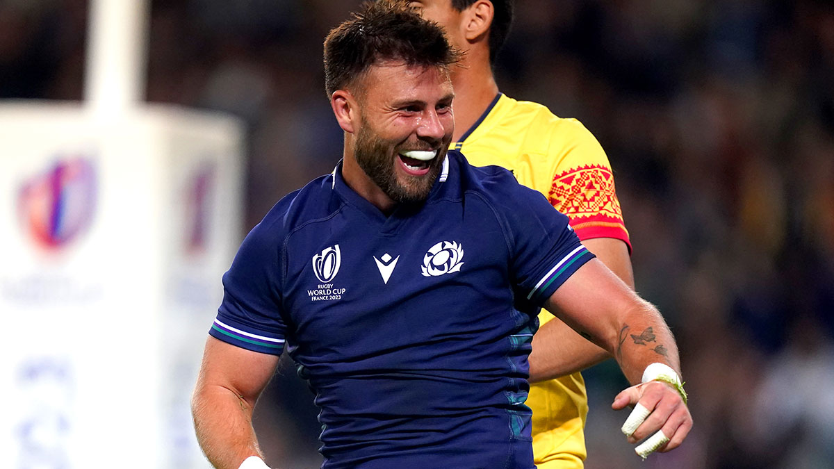 Ali Price celebrates scoring a try for Scotland v Romania at 2023 Rugby World Cup