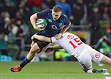 Andrew Conway is tackled by Will Hooley in Ireland v USA match