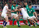 Andrew Porter is tackled by Manu Tuilagi during Ireland v England match in 2023 Six Nations