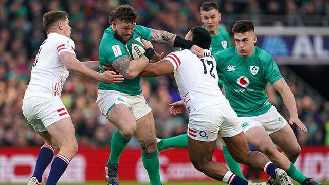 Andrew Porter is tackled by Manu Tuilagi during Ireland v England match in 2023 Six Nations