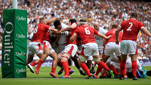 Billy Vunipola powers his way through to score England's first try against Wales at Twickenham
