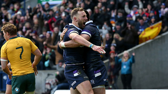 Byron McGuigan celebrates scoring Scotland's first try against Australia