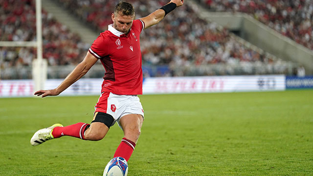 Dan Biggar kicks the ball during Wales v Fiji match in 2023 Rugby World Cup