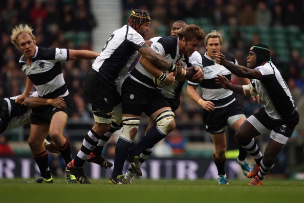 Duane Vermeulen of the Barbarians takes on the Fiji defence during the Killik Cup match between the Barbarians and Fiji at Twickenham Stadium on November 30, 2013