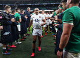 England players walk past Ireland players in 2020 Six Nations