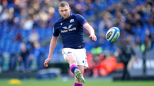 Finn Russell kicks a conversion for Scotland against Italy in 2022 Six Nations