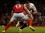 Freddie Steward runs at George North during Wales v England match in 2023 Summer Internationals