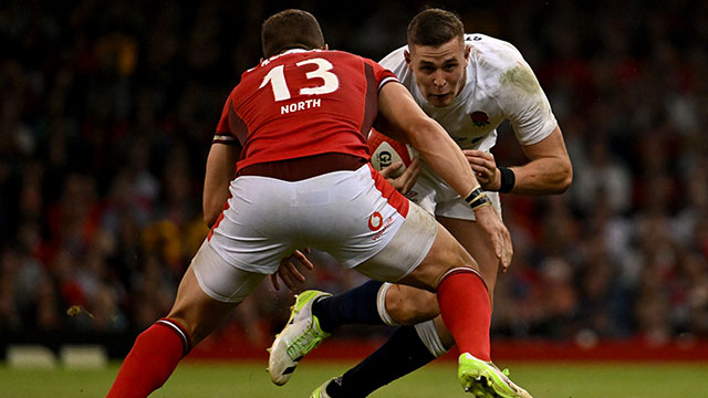 Freddie Steward runs at George North during Wales v England match in 2023 Summer Internationals