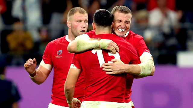 Hadleigh Parkes, Owen Watkin and Ross Moriarty celebrate after the final whistle in Wales v France quarter final