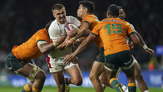 Henry Slade is tackled by Australia players during 2021 autumn internationals