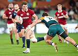 Huw Jones in action for Lions against AUS and NZ Invitational team during 2025 Lions tour