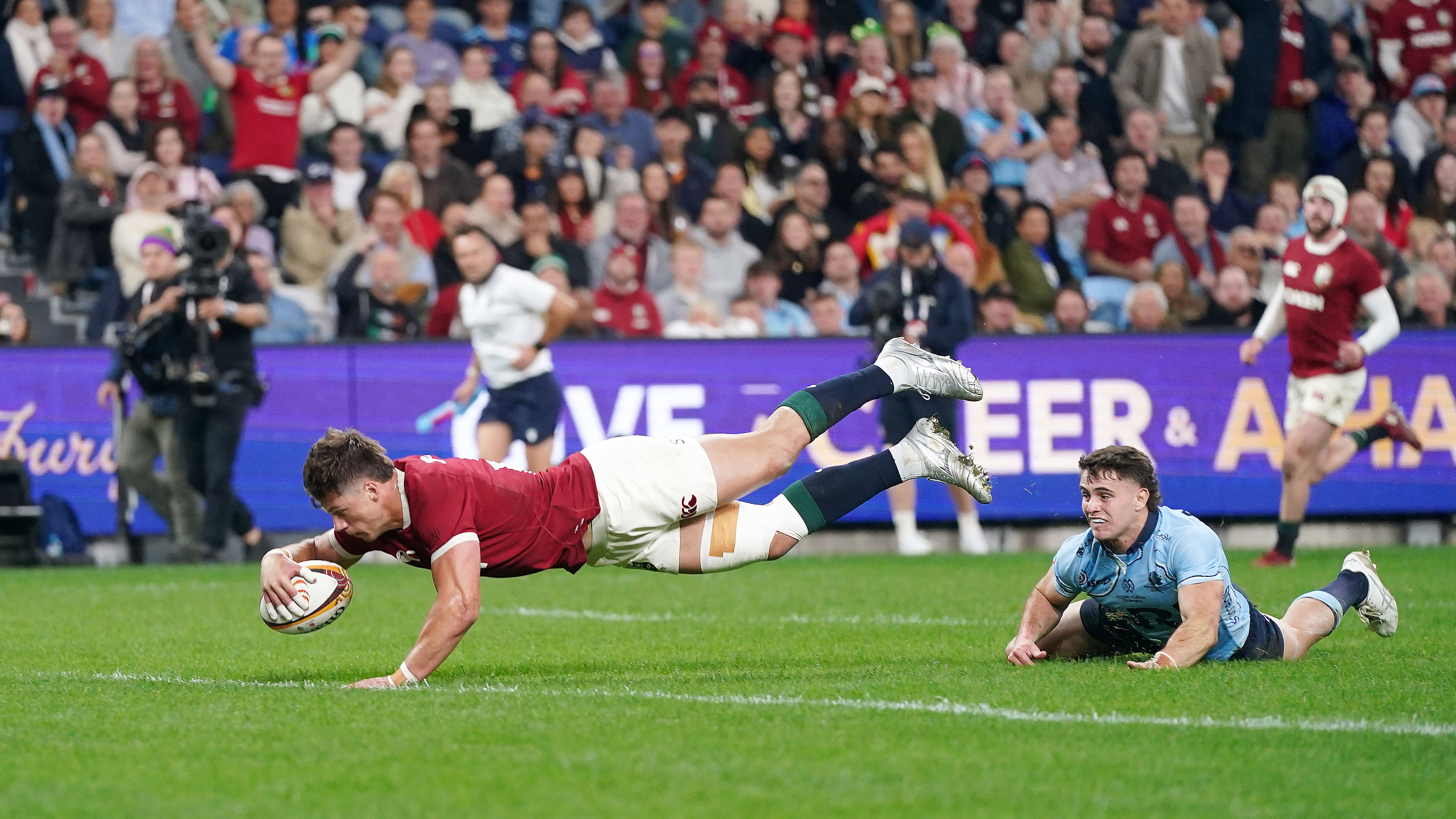 Huw Jones scores a try for Lions against NSW Waratahs during 2025 Lions Tour