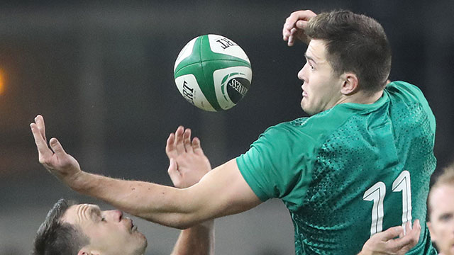 Jacob Stockdale challenges Ben Smith for the ball