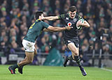 Jacob Stockdale fends off South Africa's Damian de Allende