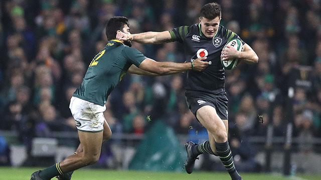 Jacob Stockdale fends off South Africa's Damian de Allende