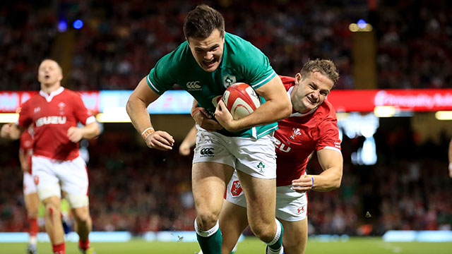 Jacob Stockdale scores the second of his two tries against Wales at Principality Stadium