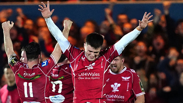 Joe Roberts celebrates a victory with the Scarlets