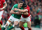 Johnny Sexton is tackled by Leigh Halfpenny during Ireland v Wales match in 2020 Six Nations