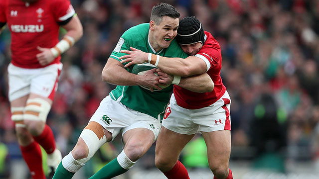 Johnny Sexton is tackled by Leigh Halfpenny during Ireland v Wales match in 2020 Six Nations