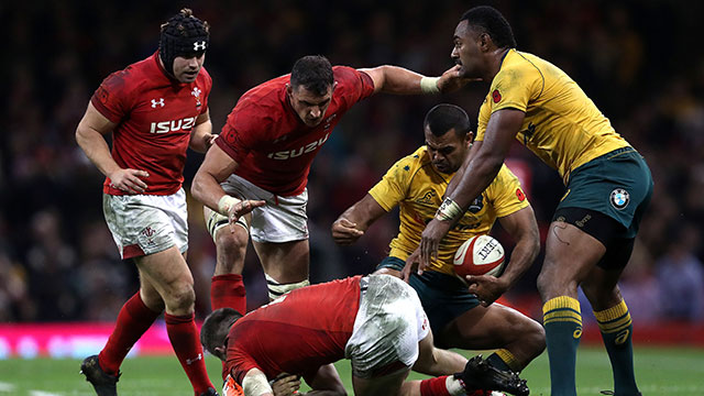 Kurtley Beale and Tevita Kuridrani tackle Wales' Steffan Evans