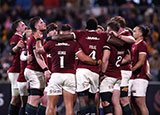 Lions players in a huddle during match against ACT Brumbies on 2025 Lions tour