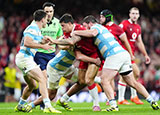 Louis Rees-Zammit is tackled in Wales v Argentina match during 2025 Autumn Internationals