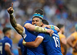 Monty Ioane celebrates a try for Italy v Uruguay at 2023 Rugby World Cup