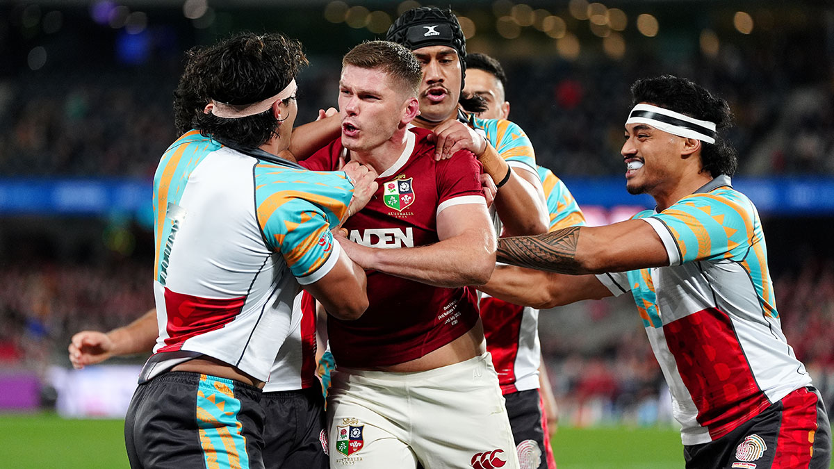 Owen Farrell and Charlie Gamble square off during First Nations and Pasifika XV match on 2025 Lions tour