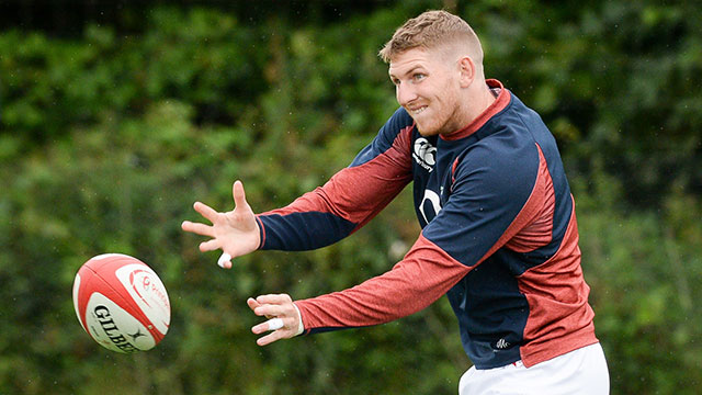 Ruaridh McConnochie passes the ball during an England training session