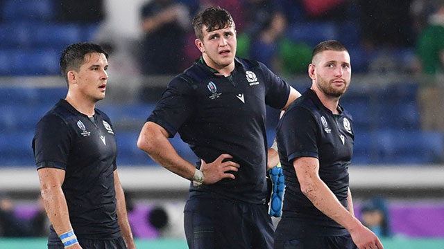 Scotland players leave the field dejected after defeat to Ireland in World Cup