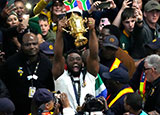 Siya Kolisi shows off the Webb Ellis Cup during a triumphant homecoming from 2023 Rugby World Cup