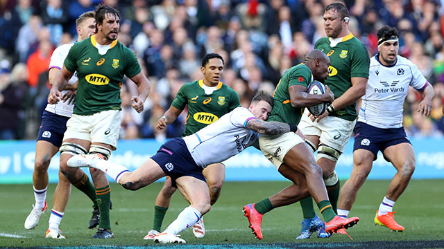 Stuart Hogg tackles Makazole Mapimpi in the Scotland v South Africa test match