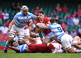 Tomos Williams is tackled by Argentina players during the summer series