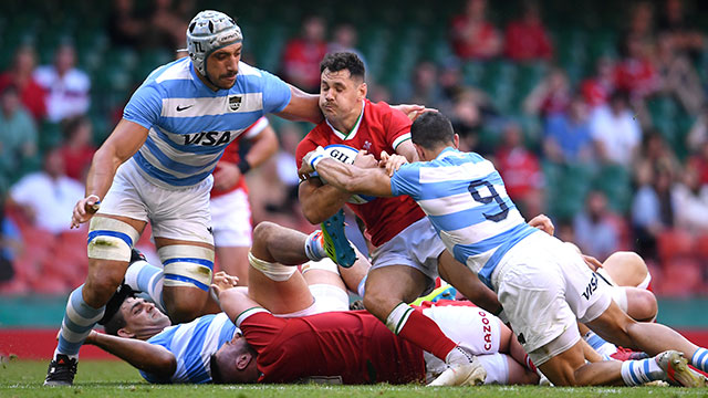 Tomos Williams is tackled by Argentina players during the summer series