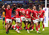 Wales players celebrate victory over Australia at 2023 Rugby World Cup