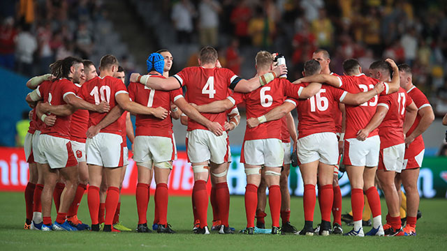 Wales players gather in circle after beating Australia at World Cup